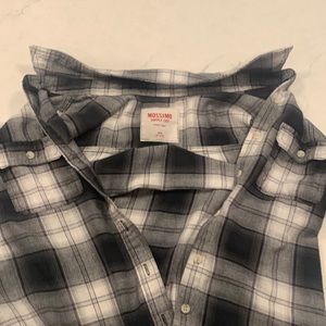 Back and white checkered flannel sweater